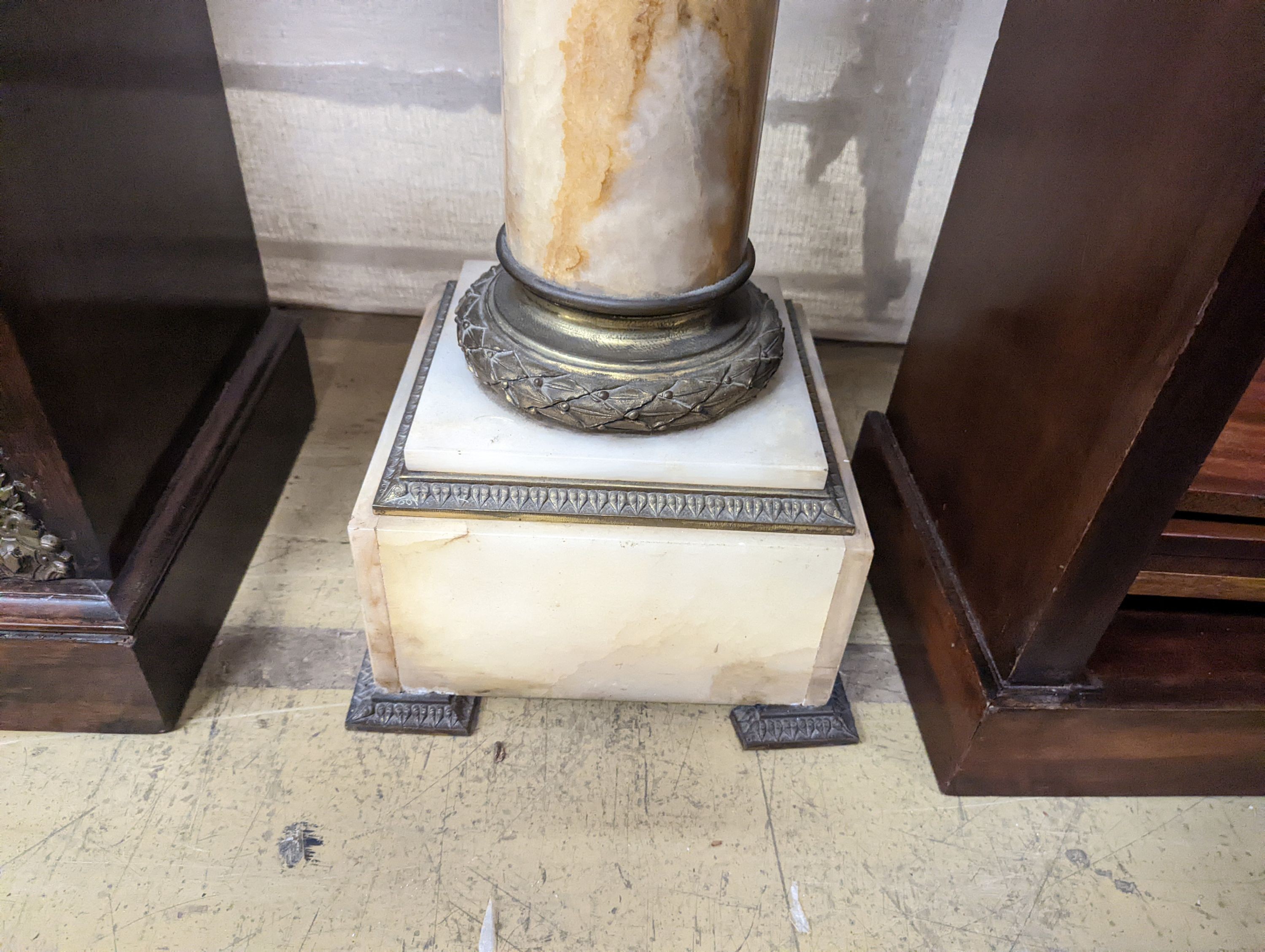 An early 20th century gilt metal mounted onyx pedestal, height 119cm
